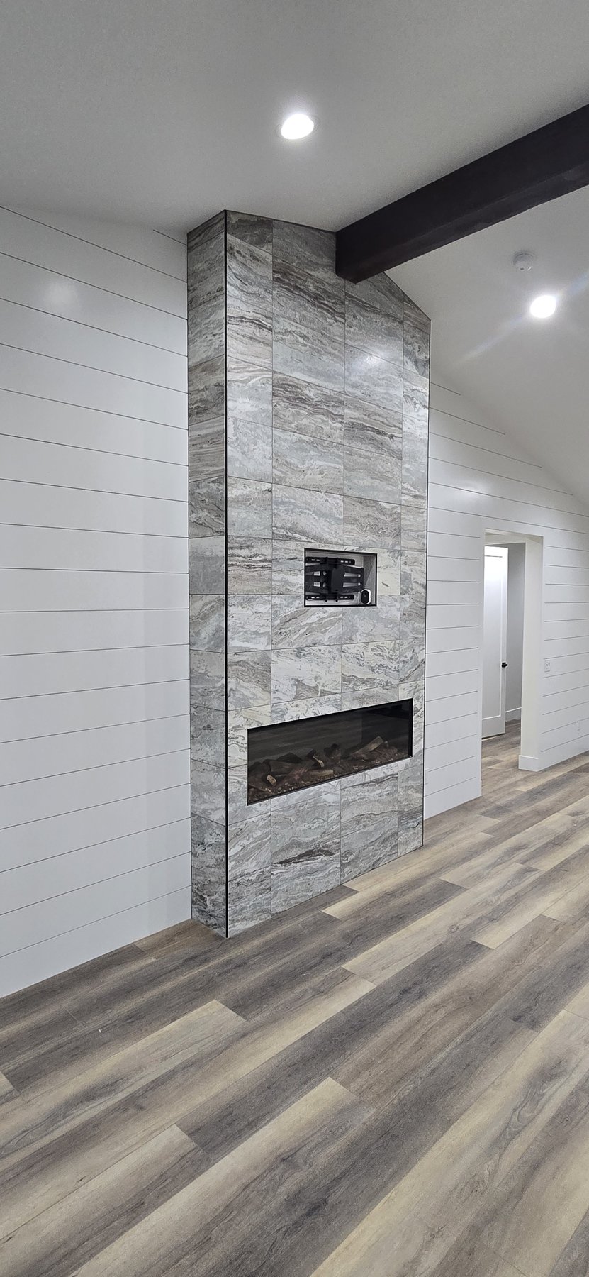 Real photo of Fantasy Brown tiled fireplace wall